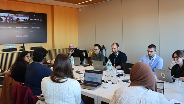 Investigadores durante el Datathon del proyecto COMMUTE en el Barcelonaβeta Brain Research Center